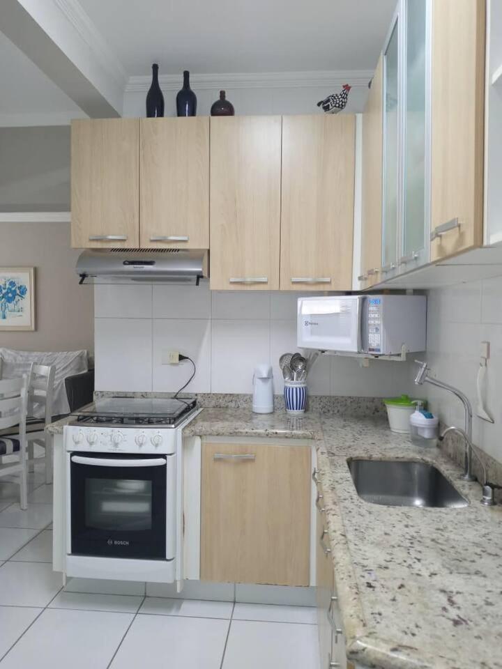 Apartamento completo na calçada da praia Apartman Guarujá Kültér fotó